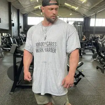 Trained by JP - NOBODY CARES, WORK HARDER Tričko v šedé barvě